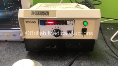 Mixed Lot Including 1 x Mindray Datascope Trio Patient Monitor Including ECG, SpO2, T1, NIBP and Printer Options (Powers Up) Eschmann TDB60 Electrosurgical Diathermy Unit with 1 x Footswitch (Powers Up with Cracked Casing-See Photo) 1 x Hospital Lamp Supp - 2