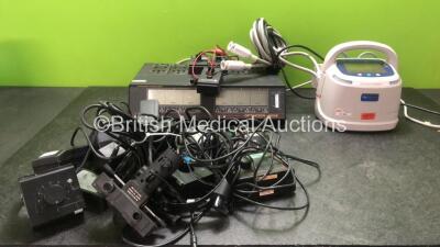 Mixed Lot Including 1 x Alexander Technologies Optimizer 2006 (Powers Up) 1 x Arjo Huntleigh Flowtron ACS900 Pump (Powers Up) 1 x Keeler Vantage Ref 1202-P-6229 Ophthalmic Head Torch with Large Quantity of AC Power Supplies (No Power)