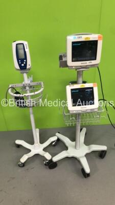 1 x Welch Allyn Spot Vital Signs Monitor on Stand with BP Cuff and 2 x Philips IntelliVue MP5 Patient Monitors on 1 x Stand (All Power Up-1 x Loose Casing and 1 x Chip to Casing-See Photos) * SN DE21078306 / DE21051709 *