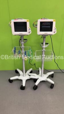 2 x Philips IntelliVue MP30 Patient Monitors Ref 862135 on Stands with 2 x Philips M3001A Patient Modules with Press/Temp,NBP,SpO2 and ECG/Resp Options * Mfd 2012 / 2006 *,2 x BP Hoses,2 x SpO2 Finger Sensors and 2 x 3-Lead ECG Leads (Both Power Up) * SN