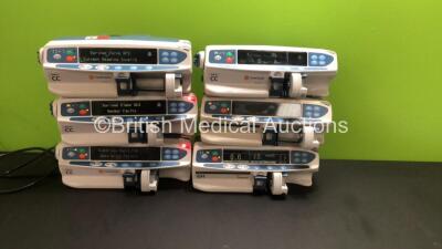 Job Lot Including 4 x Carefusion Alaris CC Syringe Pumps (All Power Up with Faults - See Pictures, 1 x Damaged Casing) and 2 x Cardinal Health Alaris GH Syringe Pumps (1 x Powers Up with Damaged Casing, 1 x Powers Up with Blank Screen) *800271425 / 800353