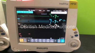 2 x Philips IntelliVue MP30 Patient Monitors *Mfds - 03/2011* with 1 x Philips M3001A Opt: A01C06 Multiparameter Module with Press, Temp, NBP, SPO2 and ECG Resp Options *Mfd - 19/03/2020* and 1 x Philips M3001A Opt: A01C12C06 Multiparameter Module with Pr - 2