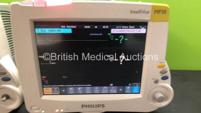 3 x Philips IntelliVue MP30 Patient Monitors *Mfds - 03/2011* with 1 x Philips M3001A Opt: A01C06 Multiparameter Module with Press, Temp, NBP, SPO2 and ECG Resp Options *Mfd - 12/08/2017* and 1 x Philips M3001A Opt: A01C12C06 Multiparameter Module with Pr - 2