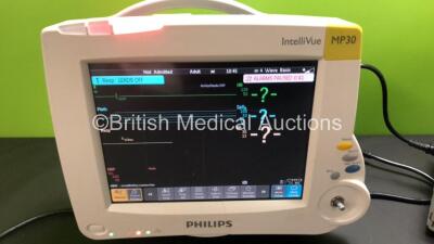 3 x Philips IntelliVue MP30 Patient Monitors *Mfds - 03/2011* with 1 x Philips M3001A Opt: A01C06 Multiparameter Module with Press, Temp, NBP, SPO2 and ECG Resp Options *Mfd - 12/08/2017* and 1 x Philips M3001A Opt: A01C12C06 Multiparameter Module with Pr - 4