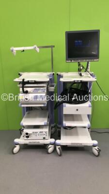 2 x Olympus Stack Trolleys with Olympus OEV191H Monitor, Olympus ECS-260 Connector Cable, Olympus Evis Lucera CV-260SL Digital Processor, Olympus Evis Lucera CLV-260SL Light Source, Olympus MAJ-1154 Pigtail Connector and Pentax EPK-1000 Video Processor (P