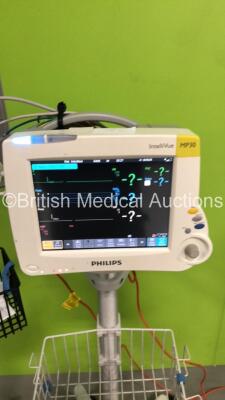 1 x Philips IntelliVue MP30 Patient Monitor Ref 862135 on Stands with 1 x Philips M3001A Patient Module with Press/Temp,NBP,SpO2 and ECG/Resp Options * Mfd 2006 *,1 x BP Hose,1 x SpO2 Finger Sensor,1 x 3-Lead ECG Lead and 1 x Philips IntelliVue MP70 Patie - 3