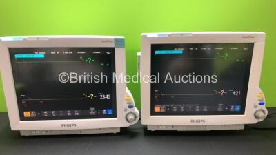 2 x Philips IntelliVue MP70 Anesthesia Patient Monitors *Mfd 2006 - 2003* with 2 x Philips M3001A Patient Modules with ECG/Resp, SpO2,NBP,Press/Temp Options *Mfd 2006* (Both Power Up with Some Missing Casing - See Photo) *DE61744499 - DE22707082 - DE610E0