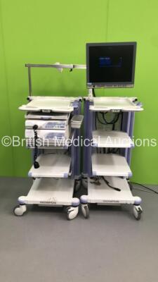 2 x Olympus Stack Trolleys with Olympus OEV191H Monitor, Olympus Evis Lucera CV260-SL Digital Processor, Olympus Evis Lucera CLV-260SL Light Source and Olympus MAJ-1154 Pigtail Connector (Powers Up) *S/N 7221289 / 7711268 / 761256584*