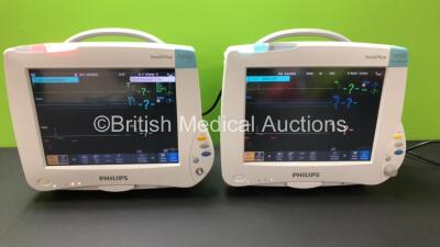 2 x Philips IntelliVue MP50 Patient Monitors (Both Power Up with 1 x Missing Dial) with 2 x Philips M3001A Modules Including Press-Temp, NBP, SpO2, ECG and Resp Options *Mfd 2014 - 2012* **DE907OAUJF - DE4680EVV - DE483B7497 - DE72852253*