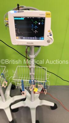 2 x Philips IntelliVue MP30 Patient Monitors Ref 862135 on Stands with 2 x Philips M3001A Patient Modules with Press/Temp,NBP,SpO2 and ECG/Resp Options * Mfd 2019 / 2013 *,2 x BP Hoses,2 x SpO2 Finger Sensors and 2 x 3-Lead ECG Leads (Both Power Up-Both C - 3