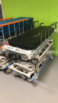 2 x Hill Rom Transtar Hydraulic Patient Trolleys with Mattresses, 1 x Linet Sprint Patient Transport Trolley with Mattress and 1 x Stryker Transport Patient Trolley with Mattress - 4