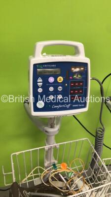 1 x CSI Criticare Vital Care 506DXNT Vital Signs Monitor on Stand and 2 x CSI Criticare ComfortCuff 506N3 Series Vital Signs Monitors on Stands (All Power Up - 1 x Damaged Handle - See Pictures *S/N 211522851 / 300362102 / 213725893* - 4
