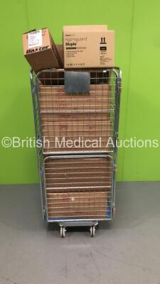 Cage of Mixed Consumables Including Surgical Gowns, Baxter Light Sensitive Drugs Sets and Oxiplex / AP Absorbable Adhesion Barrier Gel (Cage Not Included - Out of Date)