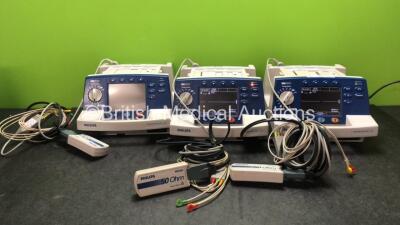 3 x Philips Heartstart XL Smart Biphasic Defibrillators Including ECG and Printer Options with 3 x Paddle Leads, 3 x 3 Lead ECG Leads and 3 x Philips M3725A Test Loads (All Power Up)