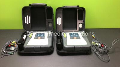 2 x Zoll AED Pro Defibrillators with 2 x Carry Cases, 2 x Electrodes and 1 x Battery (Both Power Up with Screen Damage)