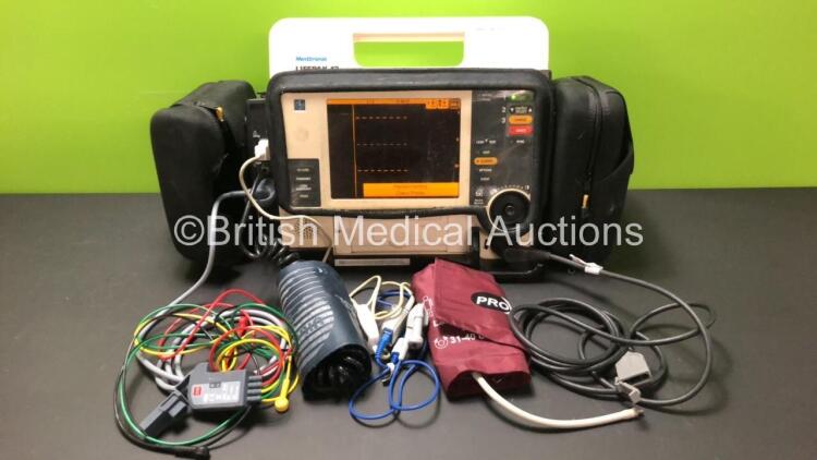 Medtronic Physio Control Lifepak 12 Biphasic Defibrillator / Monitor Including ECG, SpO2, NIBP and Printer Options with 1 x Physio Control Ref 11111-000019 4 Lead ECG Lead, 1 x NIBP Hose with 2 x Cuffs, 1 x Trunk Lead , and 1 x SpO2 Finger Sensor in Carry