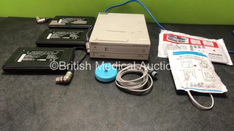 Mixed Lot Including 3 x Nippy 3+ / jnr+ Ventilator External Batteries, 1 x Nautilus US Transducer / Probe, 1 x Sony RMO-S561 MO Disk Unit (Powers Up) 1 x CU Medical Systems Adult Defibrillator Pads, 1 x Philips Heartstart Smart PADS III *Exp 09/2022*