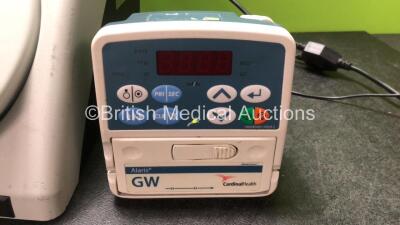 Mixed Lot Including 1 x Ambu+ aScope Monitor with 1 x AC Power Supply (No Power) 1 z ConMed Smoke Evacuator Unit (Powers Up) 1 x Cardinal Health Alaris GW Volumetric Pump (Powers Up with Fault and Alarm-See Photo) - 4