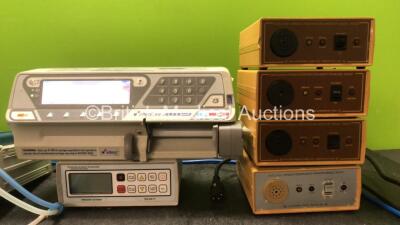 Mixed Lot Including 1 x Radiometer Copenhagen TCM4 Series Monitor (Powers Up with Cracked Screen-See Photo) 1 x Quick Rinse Automated Instrument Rinse System (Untested Due to Missing Power Supply) 1 x Aitecs 2015 Syringe Pump (Powers Up) 4 x Eastleigh RE2 - 3