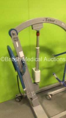 1 x Arjohuntleigh Tenor Electric Patient Hoist with Battery and Controller (Suspect Flat Battery), 1 x Arjo Maxi-Move Electric Patient Hoist with Battery and Controller (Powers Up) and 1 x Arjo Encore Electric Patient Hoist with Battery and Controller (No - 4