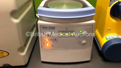 Mixed Lot Including 1 x Laerdal Suction Unit with Cup and Lid *Mfd 2014* 1 x Oxylitre Petite Elite Portable Suction Unit *Mfd 2014* and 1 x Fisher&Paykel MR850AEK Respiratory Humidifier *Mfd 2013* (All Power Up) *78471474566 - 26807005 - 130520179016* - 3