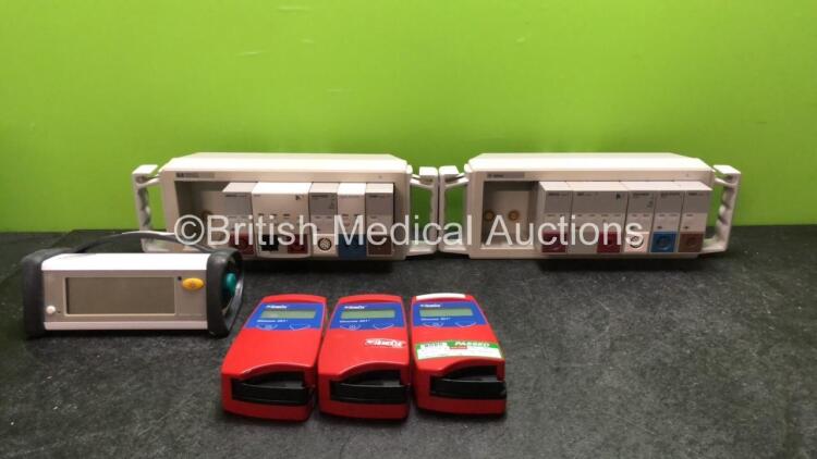 Mixed Lot Including 1 x GE TruSat Oximeter, 3 x Hemocue Glucose 201+ Glucose Analyzers, 2 x Module Racks with 2 x Agilent DRUCK Modules, 2 x Agilent NBP Modules (1 with Missing Cover-See Photo) 2 x EKG/RESP Modules, 2 x SpO2/PLETH Modules and 2 x TEMP Mod