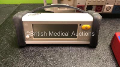 Mixed Lot Including 1 x GE TruSat Oximeter, 3 x Hemocue Glucose 201+ Glucose Analyzers, 2 x Module Racks with 2 x Agilent DRUCK Modules, 2 x Agilent NBP Modules (1 with Missing Cover-See Photo) 2 x EKG/RESP Modules, 2 x SpO2/PLETH Modules and 2 x TEMP Mod - 2