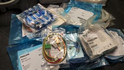 Mixed Lot Including DeVilbiss Homecare Suction Unit (Powers Up, Missing Cup and Power Supply) 1 x Spring TMS Total Migraine System (Untested Due to Missing Power Supply) Various Patient Monitoring Cables Including SpO2 Extension Leads, NIBP Leads and ECG - 3