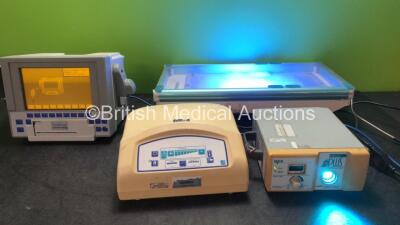 Mixed Lot Including 1 x Trend Care Satellite TMC6000 Blood Gas Monitoring System (Powers Up) 1 x Ohmeda Biliblanket Plus Phototherapy System (Powers Up) 1 x Sidhil Trio II Pump (No Power) 1 x Medela BiliBed Infant Warmer (Powers Up)