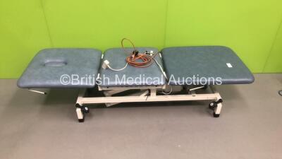 5 x Huntleigh 3 Way Electric Patient Examination Couches (4 x Power Up - 1 x Cut Power Supply - All Cushions Have Rips / Marks on - See Pictures) ***1 in Picture - 5 in Lot***