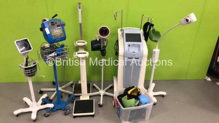 Mixed Lot Including 3 x Blood Pressure Meters on Stands, 2 x Seca Stand on Weighing Scales 1 x Welch Allyn Patient Examination Lamp, 1 x GE Dinamap Pro 300 V2 Vital Signs Monitor on Stand (No Power - Damaged - See Pictures) and 1 x Dignitana Digini C3 Sca