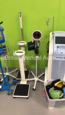 Mixed Lot Including 3 x Blood Pressure Meters on Stands, 2 x Seca Stand on Weighing Scales 1 x Welch Allyn Patient Examination Lamp, 1 x GE Dinamap Pro 300 V2 Vital Signs Monitor on Stand (No Power - Damaged - See Pictures) and 1 x Dignitana Digini C3 Sca - 3