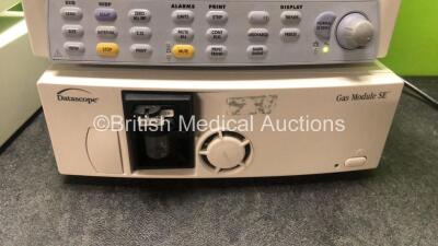 2 x Datascope Spectrum Patient Monitors Including ECG, IBP1, IBP2, SpO2 and T1 Options, 2 x Datascope Gas Module SE Including D-fend Water Trap (Powers Up) *SN MM01389-E3, 5046674, MM17206A8, 4985606-H3* - 5