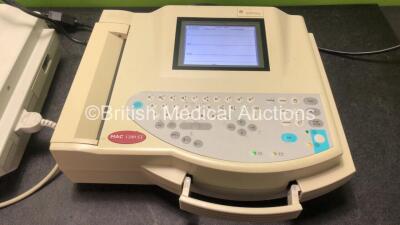 2 x GE MAC 1200 ST ECG Machines with 1 x 9 Lead ECG Lead (Both Power Up - 3