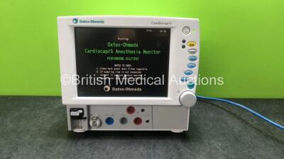 Datex Ohmeda Cardiocap 5 Anesthesia Monitor Including ECG, SpO2, P1, P2, T1, T2 and Gas POptions with D-fend Watertrap (Powers Up) *Mfd 07-2004* *SN FBWG01975*