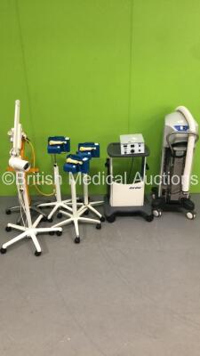 Large Mixed Lot Including 1 x Luxo Patient Examination Light on Stand,1 x EZ EM Protocol Colon Insufflator,1 x Arizant Healthcare Polar Air II Unit * Buttons Damaged *,3 x Medela Lactina Electric Plus Breast Pumps and 2 x Regulators on Stand with Hose