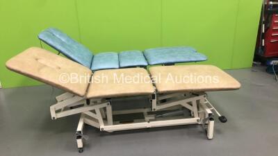 1 x Akron 3 Way Hydraulic Patient Examination Couch and 1 x Plinth Co 3 Way Electric Patient Examination Couch with Controller (Powers Up)