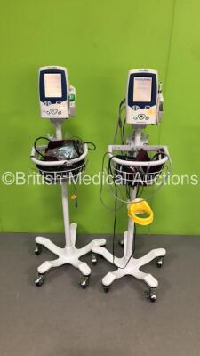 2 x Welch Allyn Spot Vital Signs LXi Patient Monitors on Stands with 2 x SpO2 Finger Sensors,1 x BP Hose and 4 x BP Cuffs (Both Power Up)