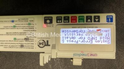 Mixed Lot Including 1 x CME Medical T34 Ambulatory Syringe Pump (Powers Up with System Error-See Photo) 1 x Cardinal Health Alaris PK Pump (Powers Up with Blank Screen and Alarm) 1 x Fukuda Denshi HS-8312N Module Including ECG, SpO2, AUX, MULTI 1, 2, 3 an - 2