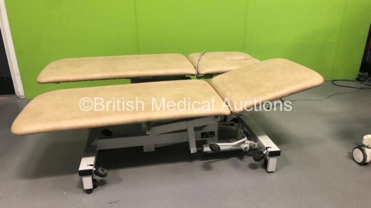 1 x Plinth Electric Patient Examination Couch with Controller (Powers Up) and 1 x Plinth 2000 Hydraulic Patient Examination Couch (Hydraulics Tested Working)