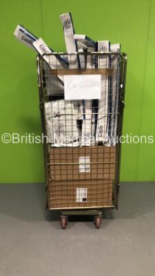 Cage of Mixed Consumables Including Cordis Angiographic Catheters,Liko Solo High Back Slings and 365 Healthcare IV Cannulation Packs (Cage Not Included)