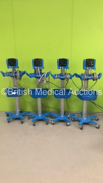 4 x GE Carescape V100 Patient Monitors on Stands with 4 x SpO2 Finger Sensors and 4 x BP Hoses (All Power Up)