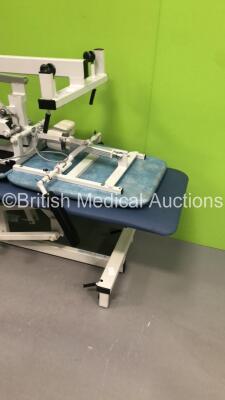 1 x Plinth Co Hydraulic Patient Examination Couch and 1 x Plinth 2000 Electric 3-Way Patient Examination Couch with Controller (1 x Powers Up,1 x Hydraulics Tested Working) - 2