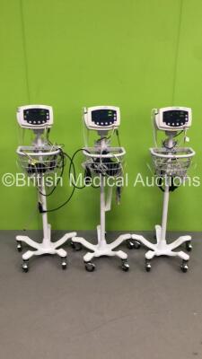 3 x Welch Allyn 53NT0 Patient Monitors on Stands with 3 x BP Hoses,2 x BP Cuffs and 3 x SpO2 Finger Sensors (All Power Up) * SN JA091607 / JA114106 *