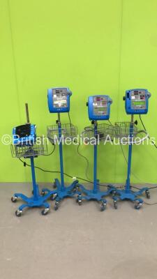 3 x GE Dinamap Pro 300V2 Patient Monitors on Stands and 1 x GE Carescape V100 Patient Monitor on Stand * Not Mounted-See Photos * (3 x Power Up,1 x Draws Power with Alarm) * SN AAX06470117SA / SH613060491SA / AAX07080170SA / AAX07080167SA *