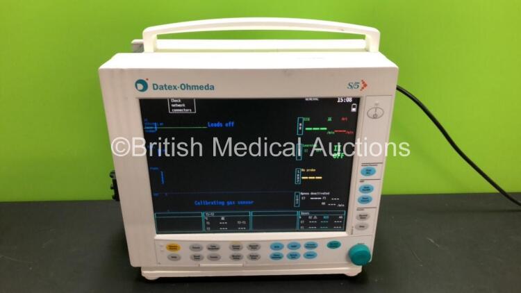 GE Datex-Ohmeda F-CM1-04 Anaesthesia Monitor (Powers Up) *Mfd 2005* with 1 x Datex-Ohmeda M-CAIO Gas Module with Water Trap and 1 x M-ESTPR Module