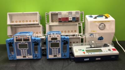 Mixed Lot Including 6 x Philips Module Racks with 1 x DRUCK Module, 1 x NBP Module, 1 x EKG/RESP Module, 1 x SpO2 / PLETH Module and 1 x Temp Module, 1 x SAM Suction Unit, 2 x Alaris SE Pumps and 1 x IVAC Pcam Pump