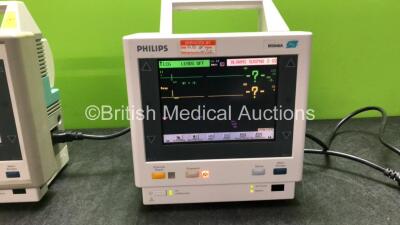 2 x Philips M3046A M4 Patient Monitors with 1 x Philips M3000A Module Including ECG/Resp, SpO2 and NBP Options and 1 x Agilent M3000A Module Including ECG/Resp, SpO2, NBP, Temp and Press Options (Both Power Up 1 with Damaged Catch-See Photo) *SN DE945369 - 3