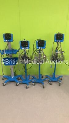 4 x GE Carescape V100 Patient Monitors on Stands with 5 x BP Hoses and 5 x SpO2 Finger Sensors (All Power Up) * SN SH614140032SA / SH619070794SA / SH619080271SA / SH611460204SA *