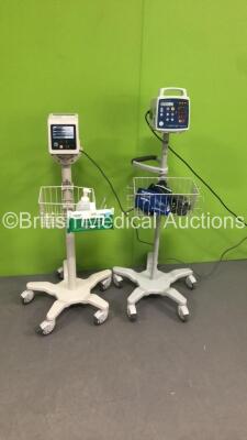 1 x Philips Patient Monitor on Stand * Missing Tag * and 1 x Criticare Systems Inc 506N3 Series Comfort Cuff Patient Monitor on Stand with 1 x BP Hose and 2 x BP Cuffs (Both Power Up)